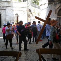 Christians pilgrims in Jerusalem walking to the Church of the Holy Sepulcher